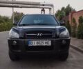 Черный Хендай Туксон, объемом двигателя 2 л и пробегом 221 тыс. км за 8600 $, фото 3 на Automoto.ua