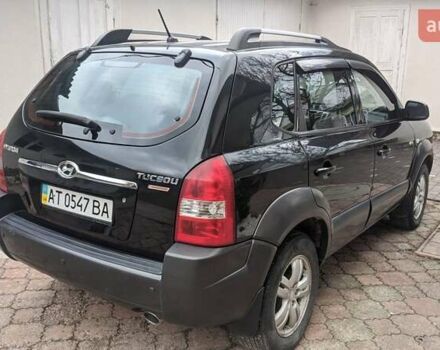Черный Хендай Туксон, объемом двигателя 2 л и пробегом 163 тыс. км за 8100 $, фото 9 на Automoto.ua