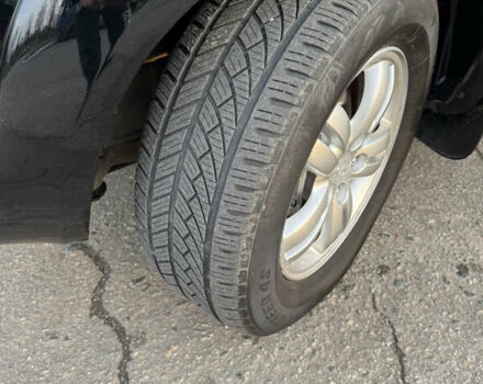 Черный Хендай Туксон, объемом двигателя 2 л и пробегом 210 тыс. км за 7850 $, фото 20 на Automoto.ua