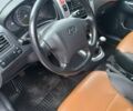 Черный Хендай Туксон, объемом двигателя 2 л и пробегом 255 тыс. км за 8700 $, фото 25 на Automoto.ua