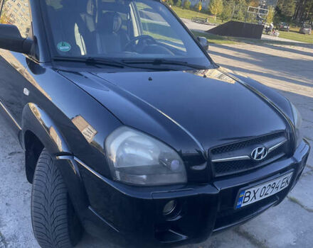 Черный Хендай Туксон, объемом двигателя 1.98 л и пробегом 262 тыс. км за 7900 $, фото 5 на Automoto.ua