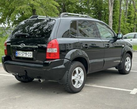Черный Хендай Туксон, объемом двигателя 2 л и пробегом 233 тыс. км за 7500 $, фото 4 на Automoto.ua