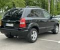 Черный Хендай Туксон, объемом двигателя 2 л и пробегом 233 тыс. км за 7500 $, фото 4 на Automoto.ua