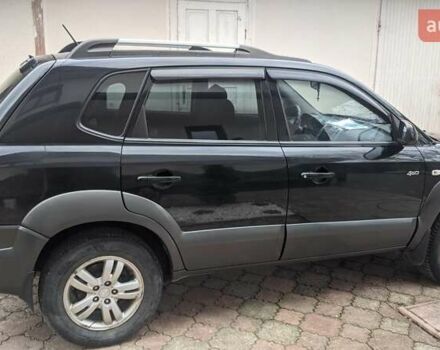 Черный Хендай Туксон, объемом двигателя 2 л и пробегом 163 тыс. км за 8100 $, фото 19 на Automoto.ua