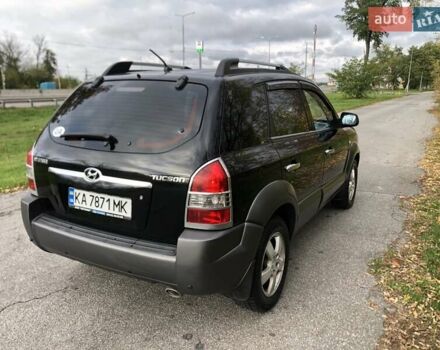 Чорний Хендай Туксон, об'ємом двигуна 1.98 л та пробігом 220 тис. км за 8000 $, фото 5 на Automoto.ua