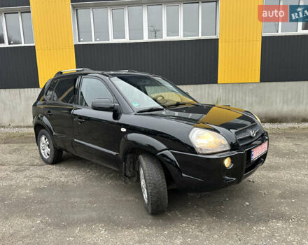Чорний Хендай Туксон, об'ємом двигуна 2 л та пробігом 243 тис. км за 7999 $, фото 25 на Automoto.ua