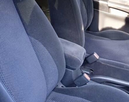 Черный Хендай Туксон, объемом двигателя 1.98 л и пробегом 200 тыс. км за 6600 $, фото 8 на Automoto.ua