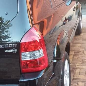 Черный Хендай Туксон, объемом двигателя 2 л и пробегом 187 тыс. км за 8800 $, фото 9 на Automoto.ua