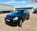 Черный Хендай Туксон, объемом двигателя 2 л и пробегом 84 тыс. км за 10300 $, фото 1 на Automoto.ua