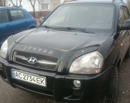 Черный Хендай Туксон, объемом двигателя 1.98 л и пробегом 283 тыс. км за 8800 $, фото 23 на Automoto.ua