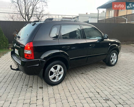 Черный Хендай Туксон, объемом двигателя 2 л и пробегом 276 тыс. км за 7450 $, фото 17 на Automoto.ua