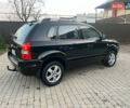 Черный Хендай Туксон, объемом двигателя 2 л и пробегом 276 тыс. км за 7450 $, фото 17 на Automoto.ua