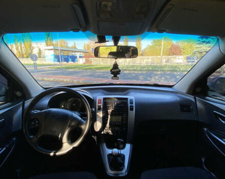 Черный Хендай Туксон, объемом двигателя 1.98 л и пробегом 218 тыс. км за 7200 $, фото 14 на Automoto.ua