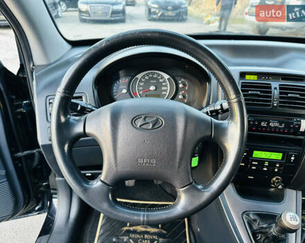 Чорний Хендай Туксон, об'ємом двигуна 2 л та пробігом 186 тис. км за 8300 $, фото 25 на Automoto.ua