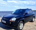 Черный Хендай Туксон, объемом двигателя 2 л и пробегом 193 тыс. км за 7900 $, фото 1 на Automoto.ua