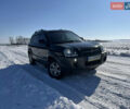 Черный Хендай Туксон, объемом двигателя 2 л и пробегом 218 тыс. км за 8600 $, фото 3 на Automoto.ua