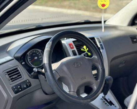 Черный Хендай Туксон, объемом двигателя 2 л и пробегом 300 тыс. км за 8300 $, фото 16 на Automoto.ua