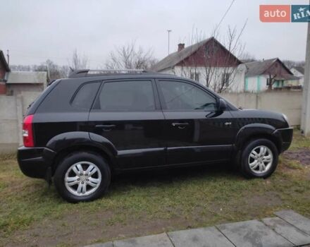 Черный Хендай Туксон, объемом двигателя 2 л и пробегом 237 тыс. км за 7500 $, фото 5 на Automoto.ua