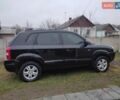 Черный Хендай Туксон, объемом двигателя 2 л и пробегом 237 тыс. км за 7500 $, фото 5 на Automoto.ua