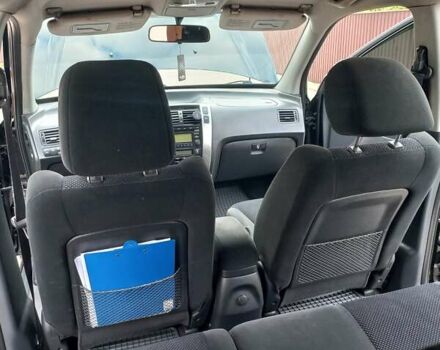 Черный Хендай Туксон, объемом двигателя 2 л и пробегом 168 тыс. км за 9000 $, фото 36 на Automoto.ua