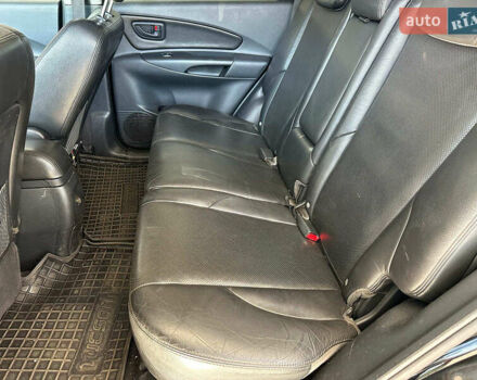 Черный Хендай Туксон, объемом двигателя 2.7 л и пробегом 158 тыс. км за 7940 $, фото 11 на Automoto.ua