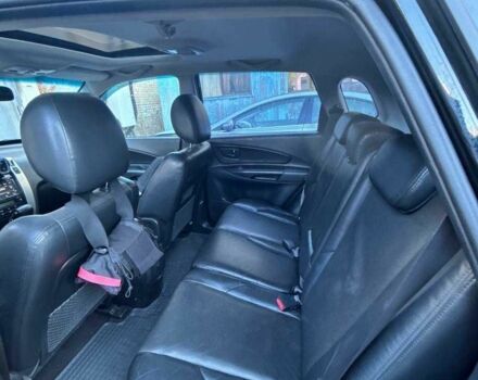 Черный Хендай Туксон, объемом двигателя 2 л и пробегом 220 тыс. км за 7000 $, фото 3 на Automoto.ua