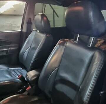 Черный Хендай Туксон, объемом двигателя 2.66 л и пробегом 311 тыс. км за 7200 $, фото 7 на Automoto.ua