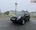 Черный Хендай Туксон, объемом двигателя 1.98 л и пробегом 165 тыс. км за 8600 $, фото 2 на Automoto.ua