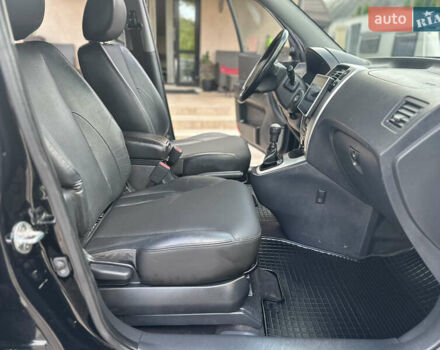 Черный Хендай Туксон, объемом двигателя 2 л и пробегом 218 тыс. км за 8700 $, фото 26 на Automoto.ua