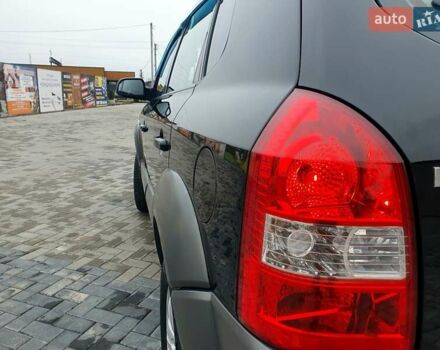 Чорний Хендай Туксон, об'ємом двигуна 2 л та пробігом 225 тис. км за 8000 $, фото 32 на Automoto.ua