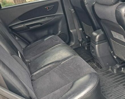 Черный Хендай Туксон, объемом двигателя 2 л и пробегом 270 тыс. км за 8300 $, фото 7 на Automoto.ua