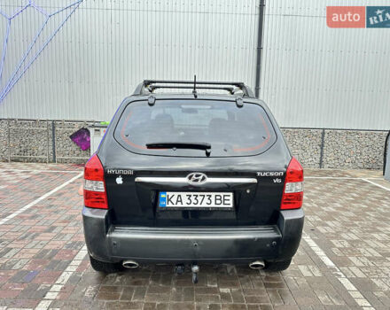 Чорний Хендай Туксон, об'ємом двигуна 2.66 л та пробігом 395 тис. км за 9950 $, фото 7 на Automoto.ua