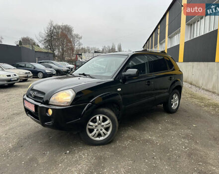 Чорний Хендай Туксон, об'ємом двигуна 2 л та пробігом 243 тис. км за 7999 $, фото 4 на Automoto.ua