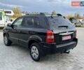Черный Хендай Туксон, объемом двигателя 1.98 л и пробегом 235 тыс. км за 7500 $, фото 4 на Automoto.ua