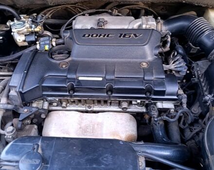 Черный Хендай Туксон, объемом двигателя 2 л и пробегом 261 тыс. км за 8900 $, фото 7 на Automoto.ua