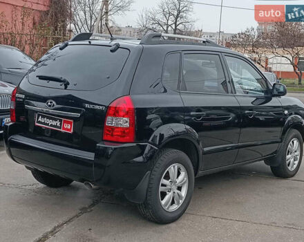 Черный Хендай Туксон, объемом двигателя 2 л и пробегом 192 тыс. км за 7990 $, фото 6 на Automoto.ua
