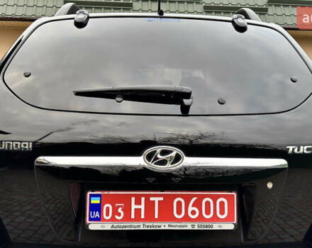 Чорний Хендай Туксон, об'ємом двигуна 2 л та пробігом 182 тис. км за 8299 $, фото 14 на Automoto.ua