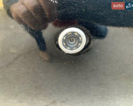 Черный Хендай Туксон, объемом двигателя 1.98 л и пробегом 260 тыс. км за 7777 $, фото 16 на Automoto.ua