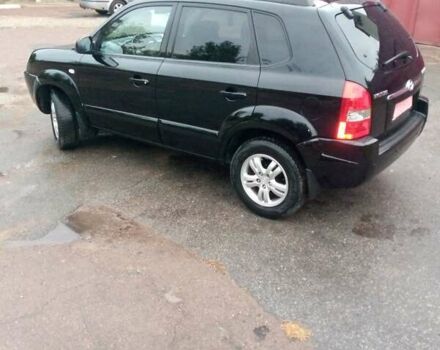 Чорний Хендай Туксон, об'ємом двигуна 2 л та пробігом 225 тис. км за 7850 $, фото 12 на Automoto.ua