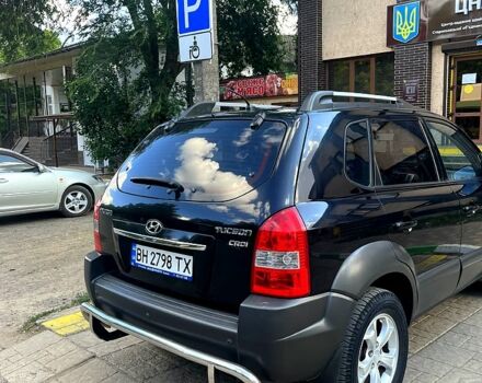 Черный Хендай Туксон, объемом двигателя 2 л и пробегом 151 тыс. км за 9000 $, фото 1 на Automoto.ua