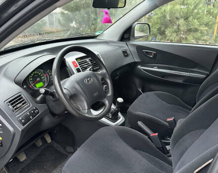 Черный Хендай Туксон, объемом двигателя 2 л и пробегом 136 тыс. км за 8500 $, фото 15 на Automoto.ua