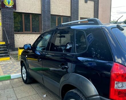 Черный Хендай Туксон, объемом двигателя 2 л и пробегом 151 тыс. км за 9000 $, фото 2 на Automoto.ua