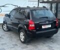 Чорний Хендай Туксон, об'ємом двигуна 2 л та пробігом 110 тис. км за 8750 $, фото 1 на Automoto.ua