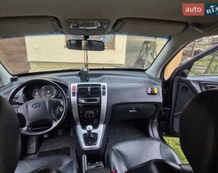 Чорний Хендай Туксон, об'ємом двигуна 1.99 л та пробігом 181 тис. км за 8150 $, фото 10 на Automoto.ua