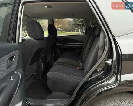 Черный Хендай Туксон, объемом двигателя 1.99 л и пробегом 240 тыс. км за 7200 $, фото 41 на Automoto.ua