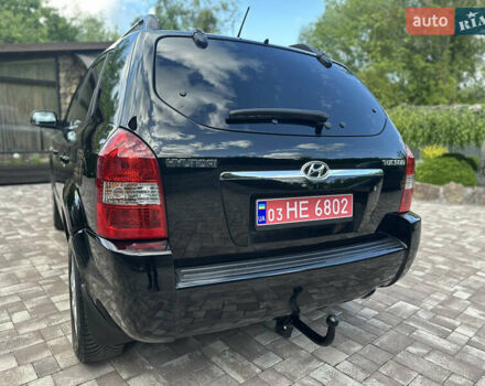 Черный Хендай Туксон, объемом двигателя 2 л и пробегом 218 тыс. км за 8700 $, фото 16 на Automoto.ua