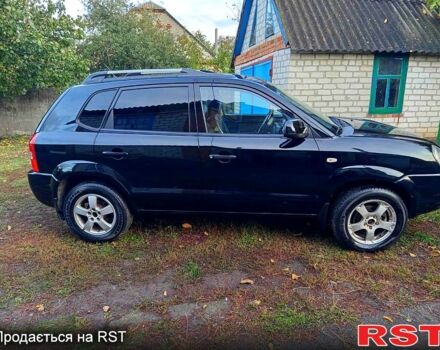 Черный Хендай Туксон, объемом двигателя 2 л и пробегом 187 тыс. км за 7900 $, фото 3 на Automoto.ua