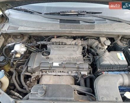 Черный Хендай Туксон, объемом двигателя 2 л и пробегом 440 тыс. км за 8000 $, фото 5 на Automoto.ua