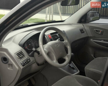 Чорний Хендай Туксон, об'ємом двигуна 2 л та пробігом 107 тис. км за 8500 $, фото 18 на Automoto.ua