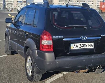 Чорний Хендай Туксон, об'ємом двигуна 1.98 л та пробігом 212 тис. км за 7766 $, фото 2 на Automoto.ua